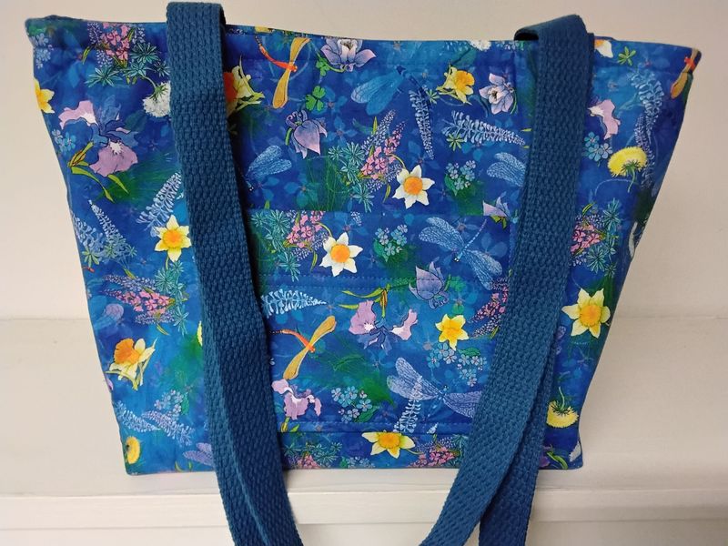 Garden flowers, dragonflies & butterflies on blue, medium blue straps