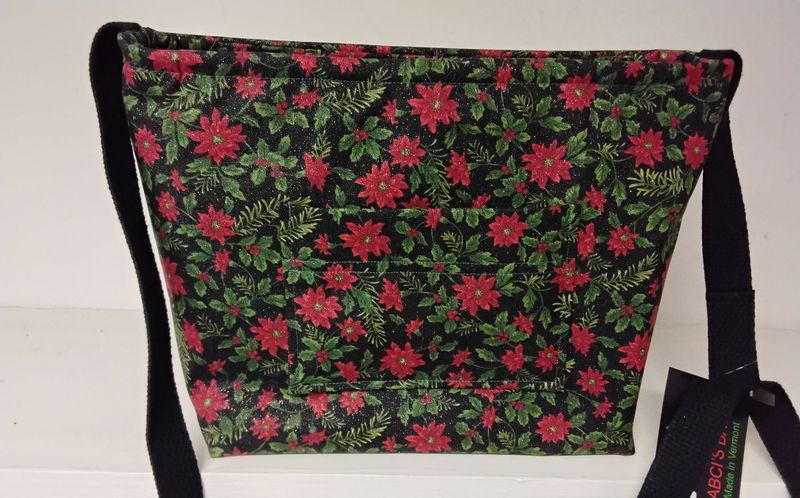ORIGINAL SIZE bag with red poinsettias and green leaves on black, with ONE LONG CROSS-BODY BLACK STRAP.  The adjustable strap measures 49.75" at maximum extension.