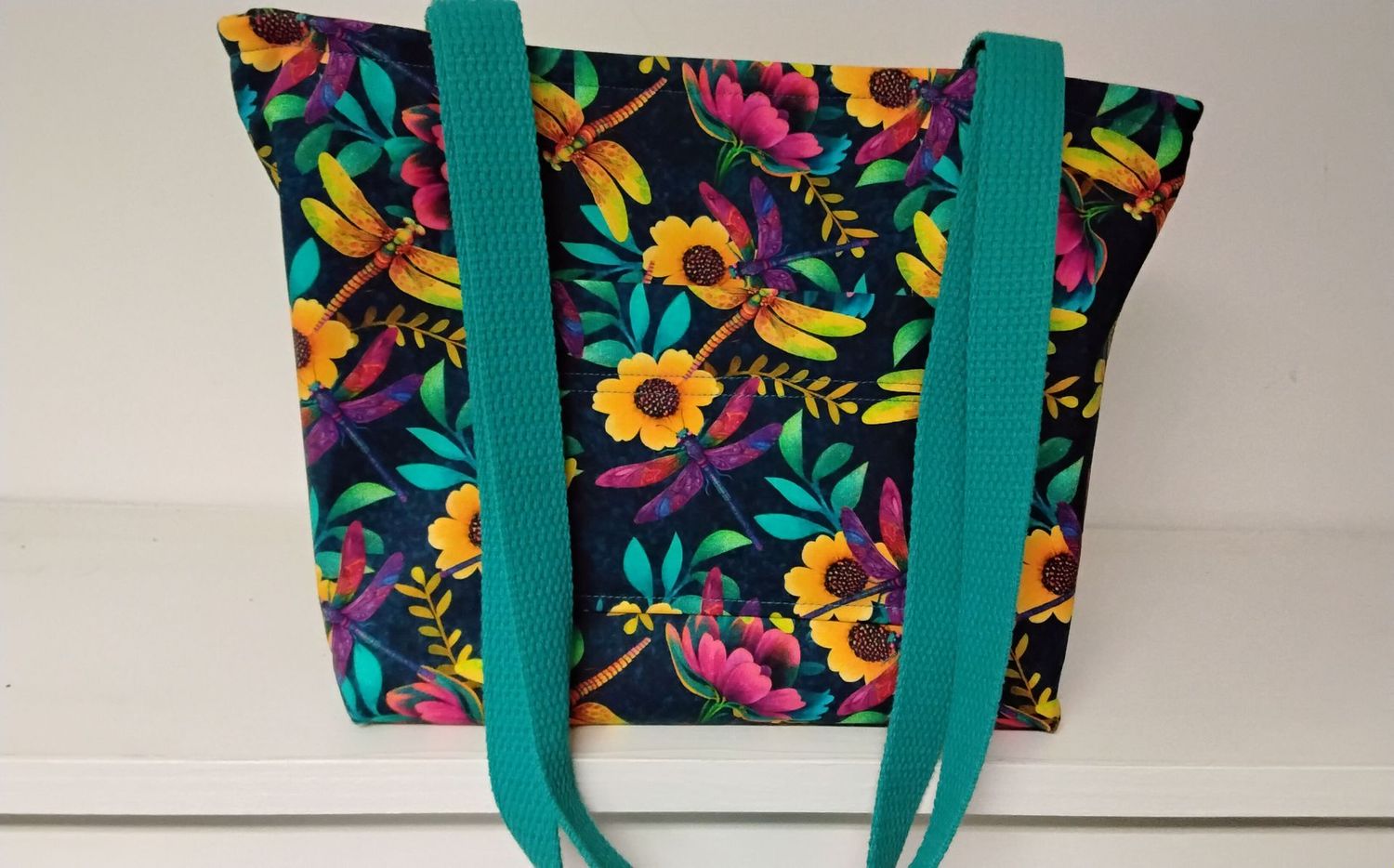 Bright floral with dragonflies on black, black straps