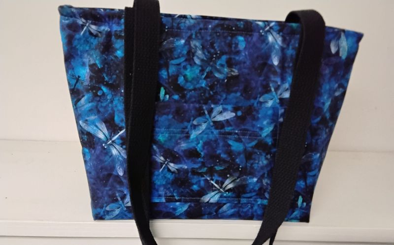 Blue dragonflies on black, black straps Blue dragonflies on black, black straps