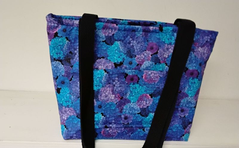 Hydrangeas in blues and purples on black, black straps Hydrangeas in blues and purples on black, black straps