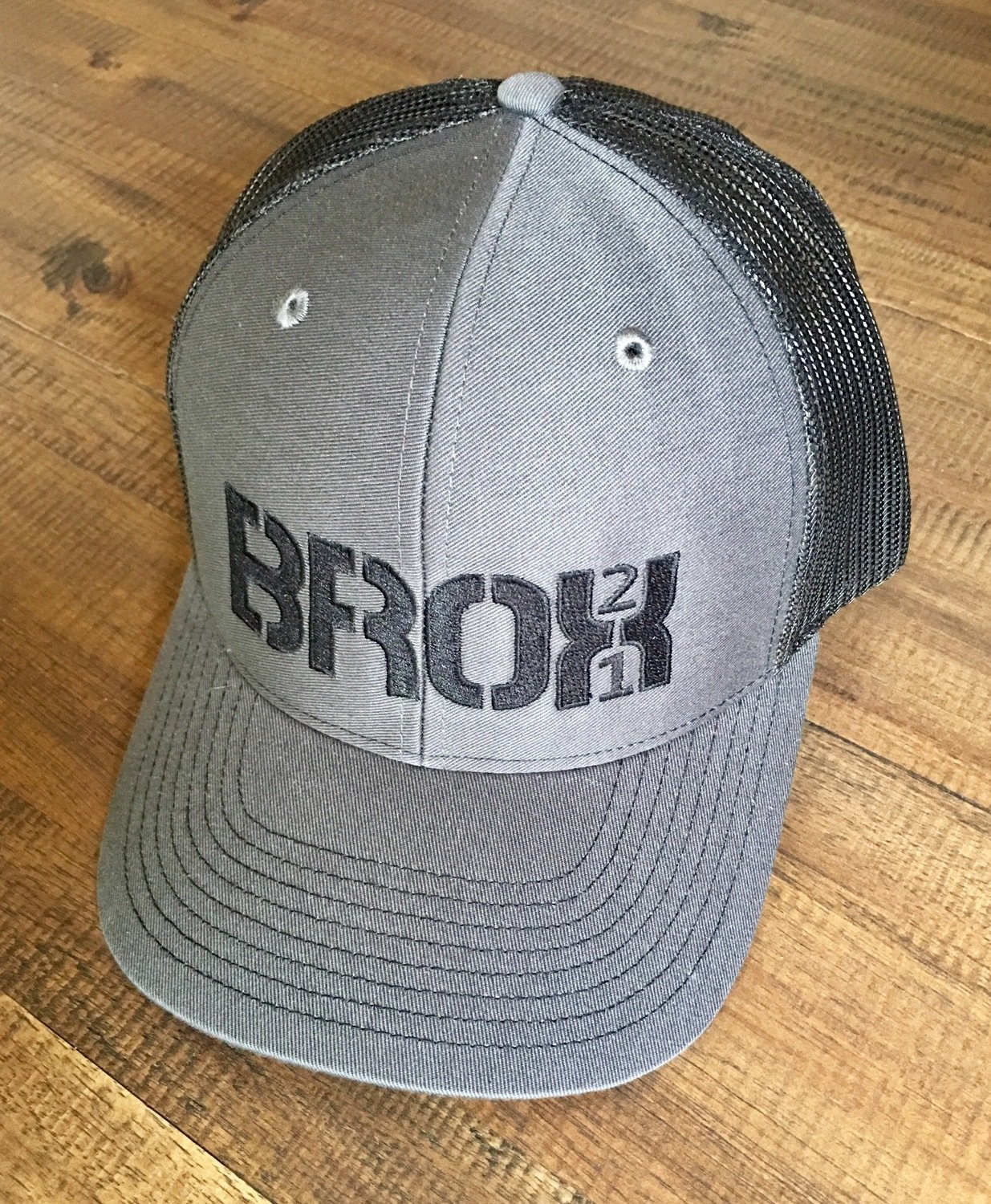 GREY TRUCKER HAT