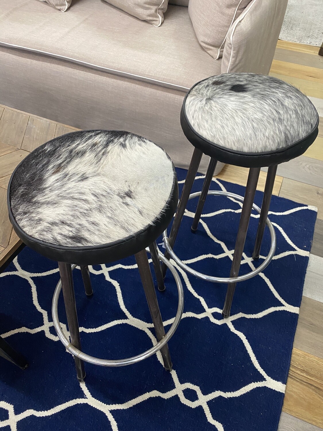 Pair of bar stools with cow hide seat