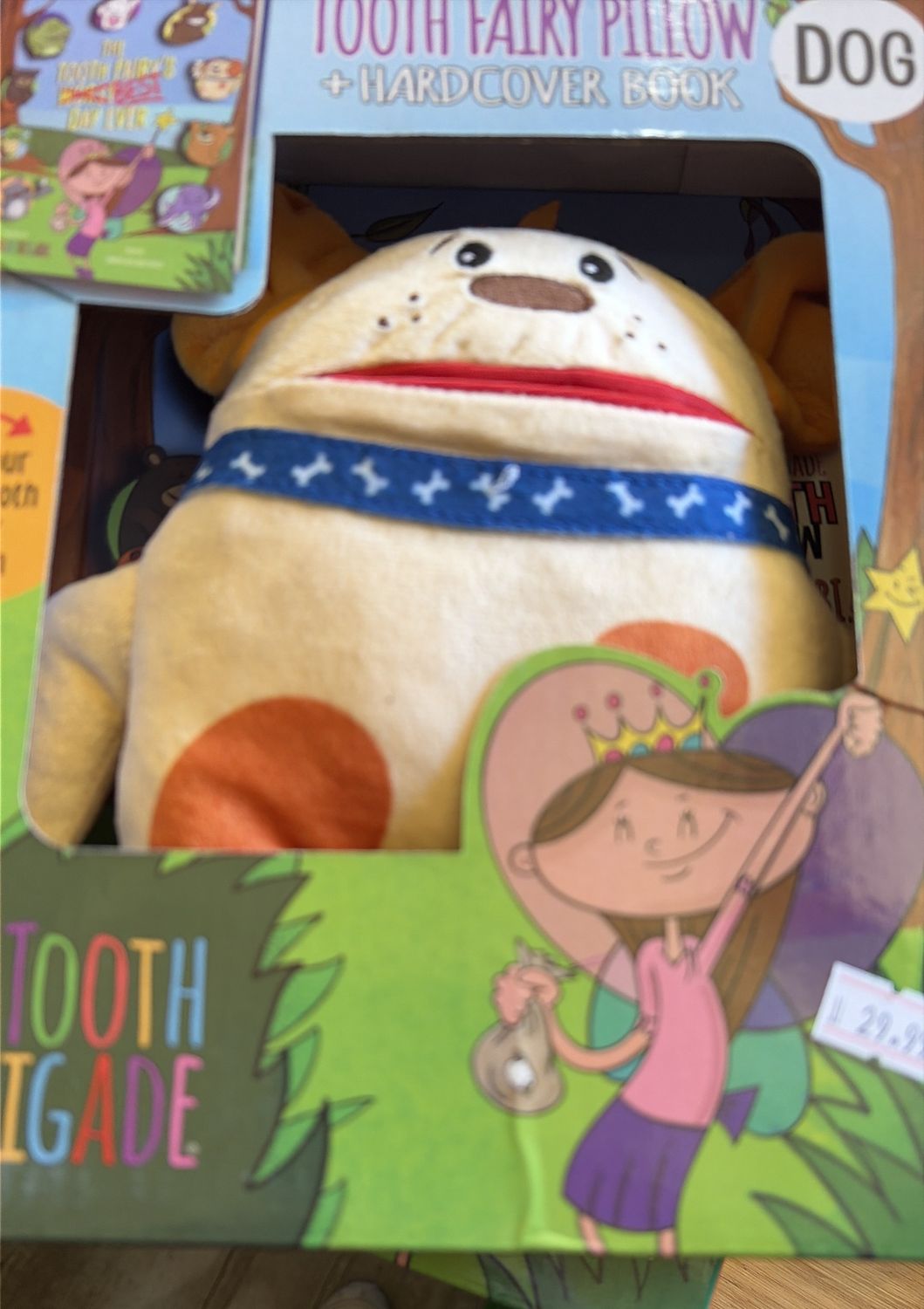 The tooth brigade pillow and book dog 
