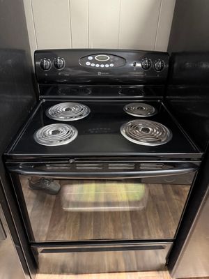Black Maytag Coil Top Oven