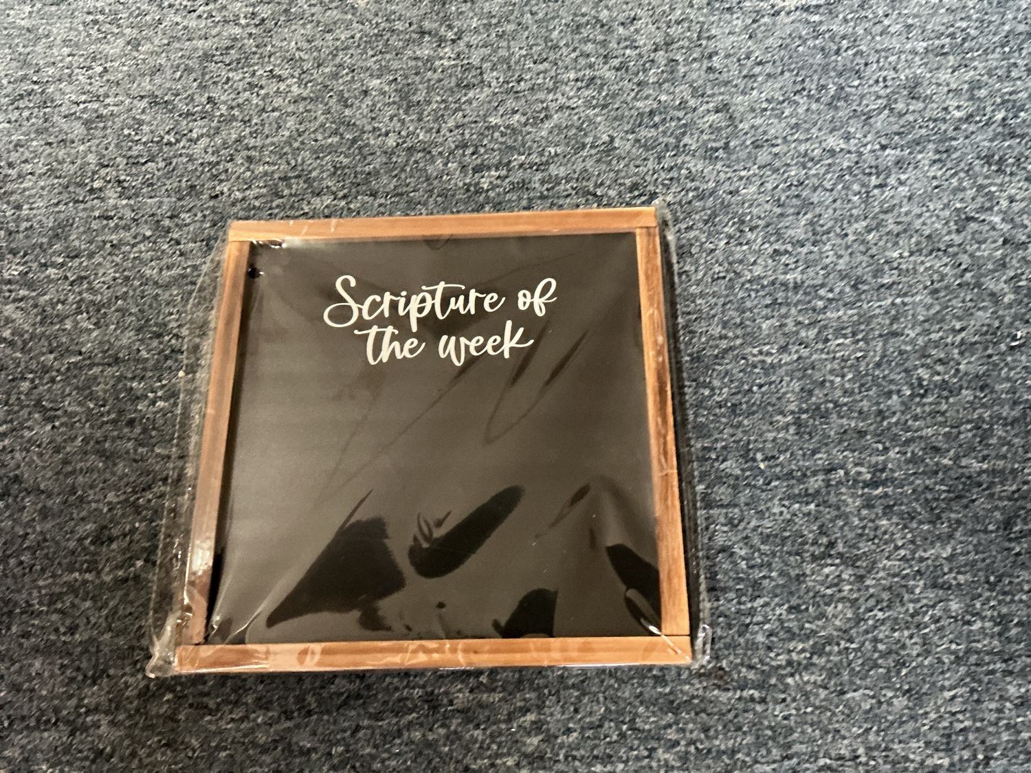 framed sign featuring the scripture of the week