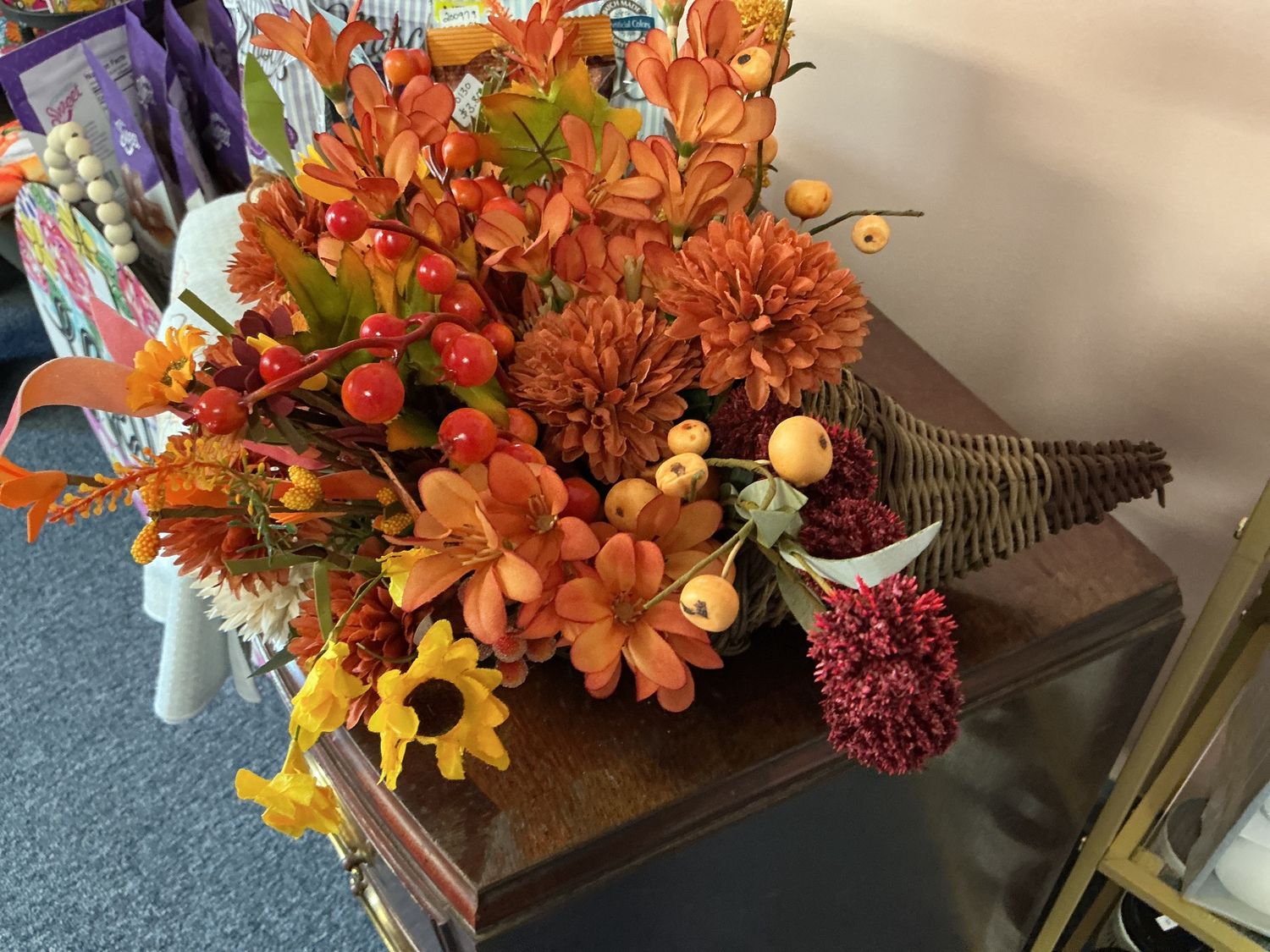Small cornucopia with fall flowers
