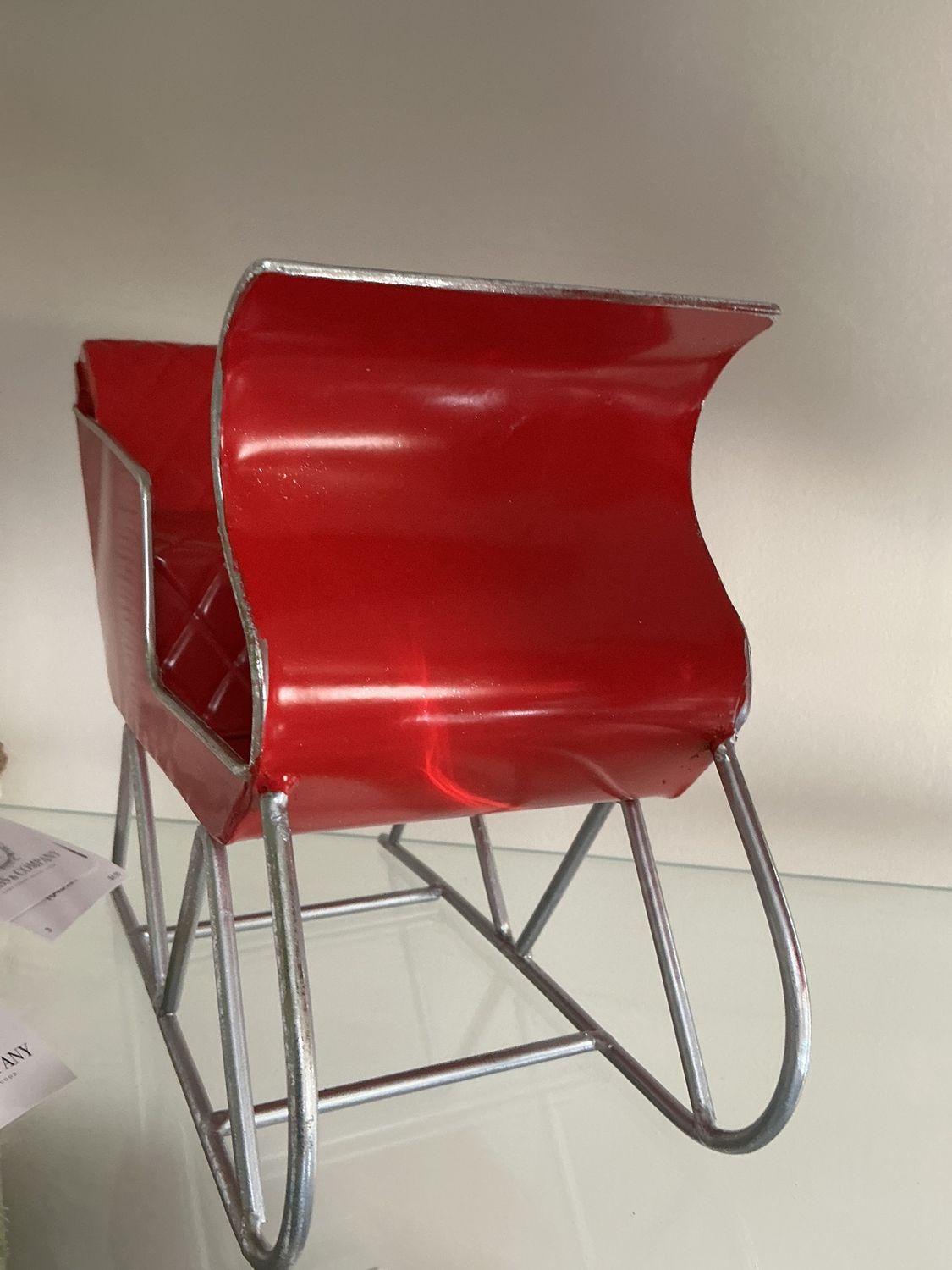 Red metal holiday sleigh