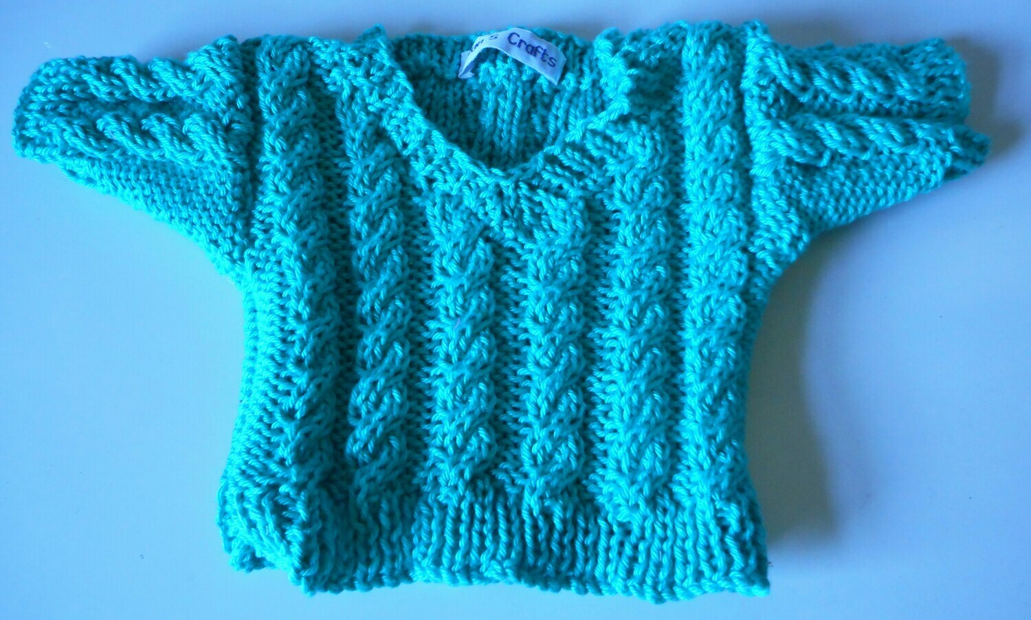Jumper, turquoise cable v neck - bear 36cm/ 14 ins high Jumper, turquoise cable v neck - bear 36cm/ 14 ins high