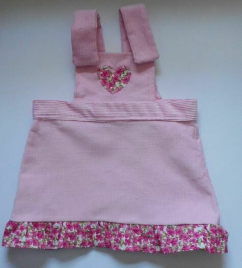 Pinafore with frill for dolls - pale pink Pinafore with frill for dolls - pale pink