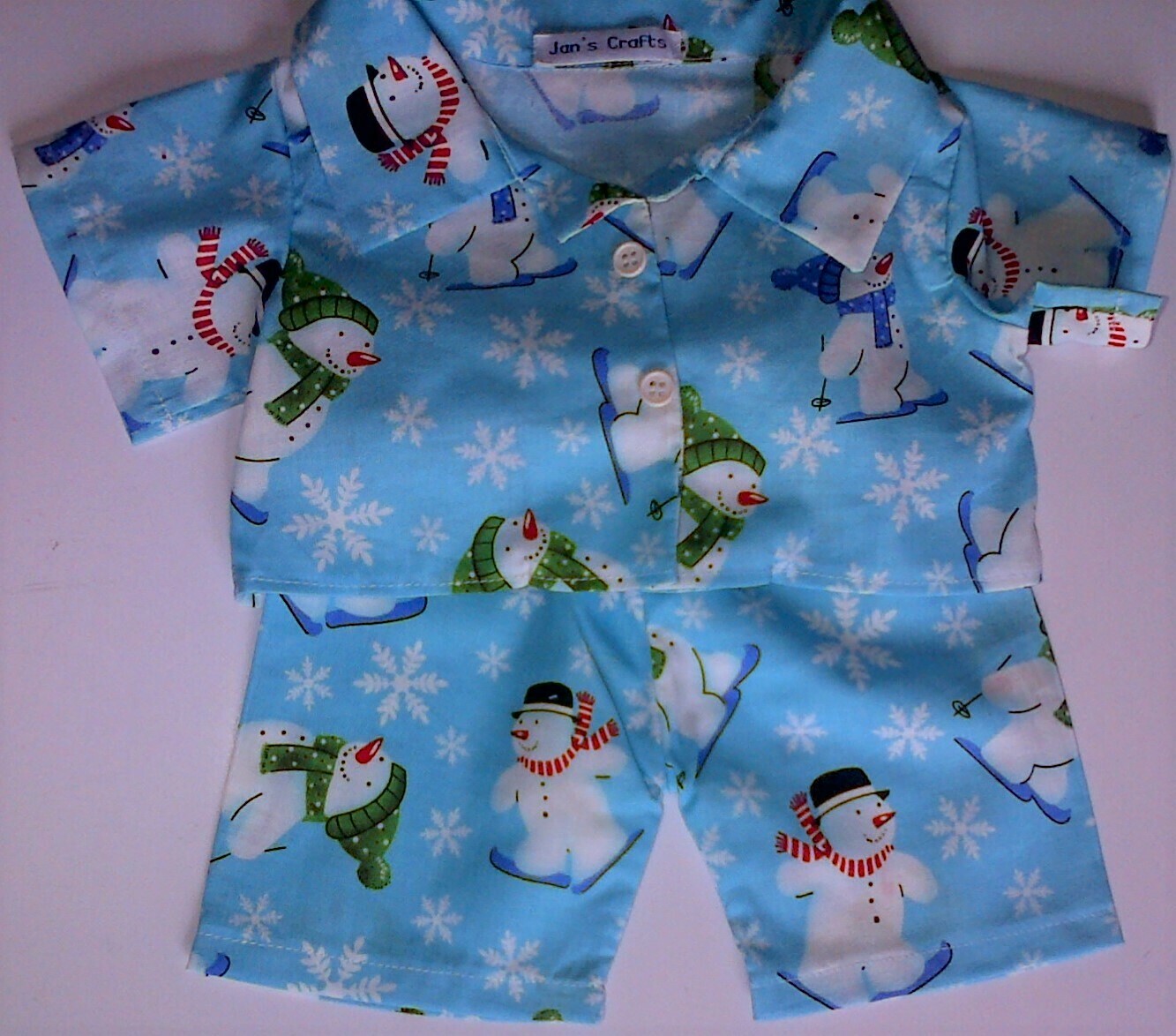 Pyjamas with collar - snowmen print cotton. Pyjamas with collar - snowmen print cotton.