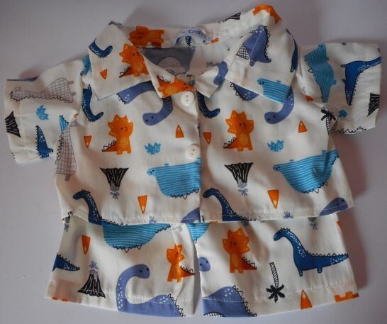 Pyjamas with collar - cream dinosaur print.