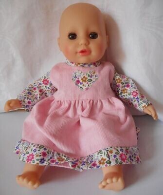 Outfit: Pale pink pinafore with matching top for 36cm doll.