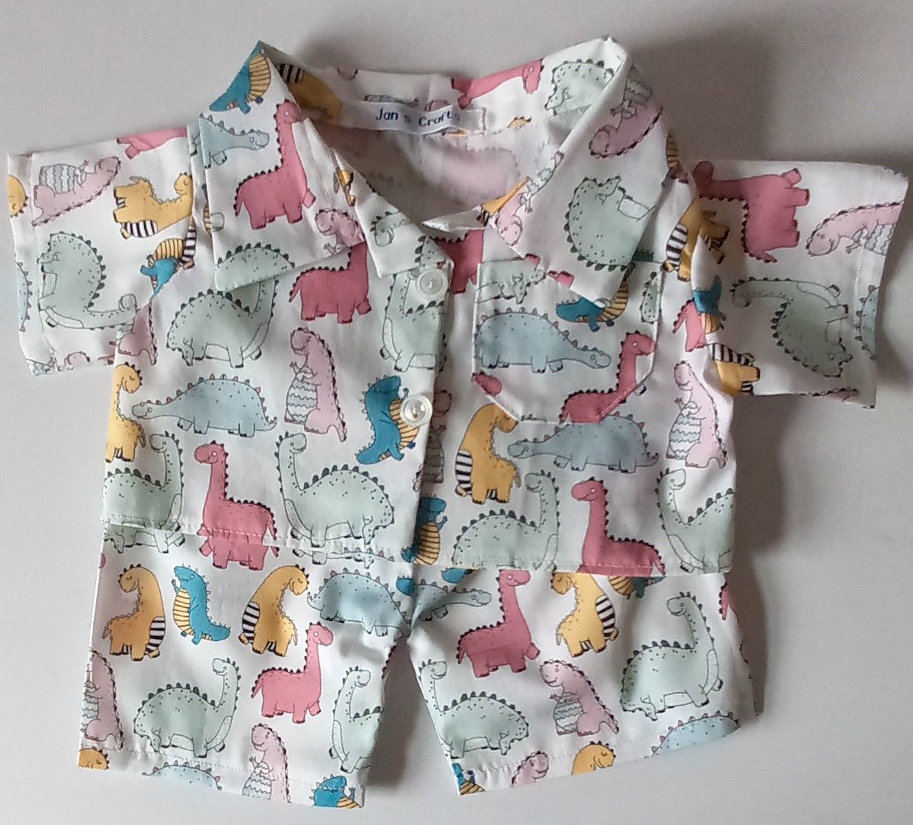 Pyjamas with collar - dinosaur print.