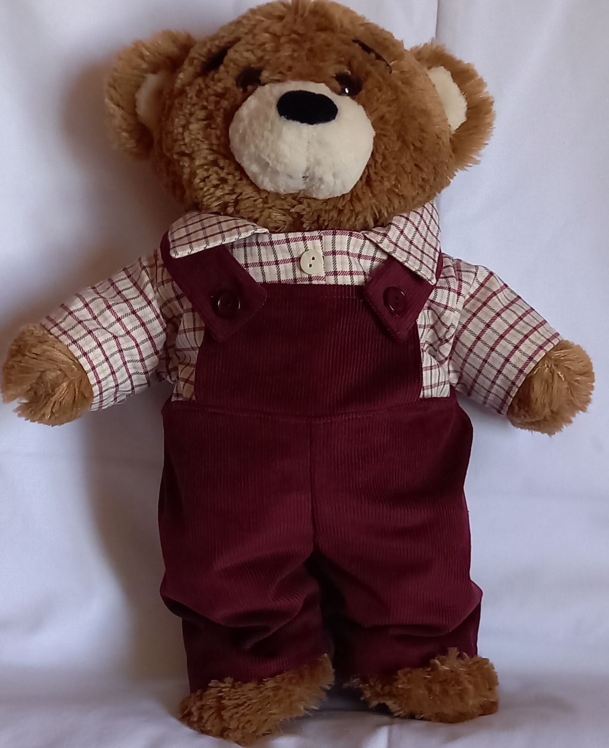 Dungarees: wine corduroy with check shirt.