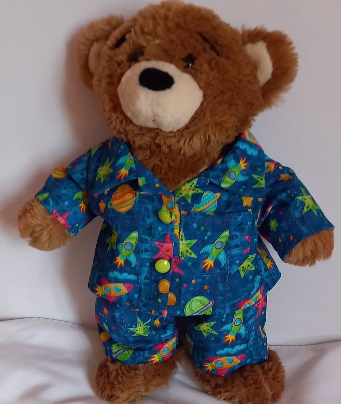 Pyjamas with collar - in a bright space print.
