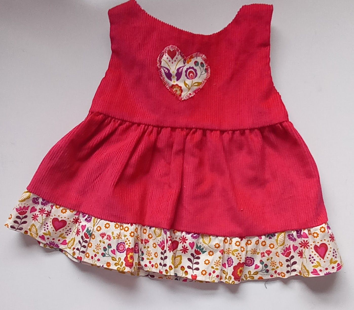 Pinafore - cerise pink with contrast frill