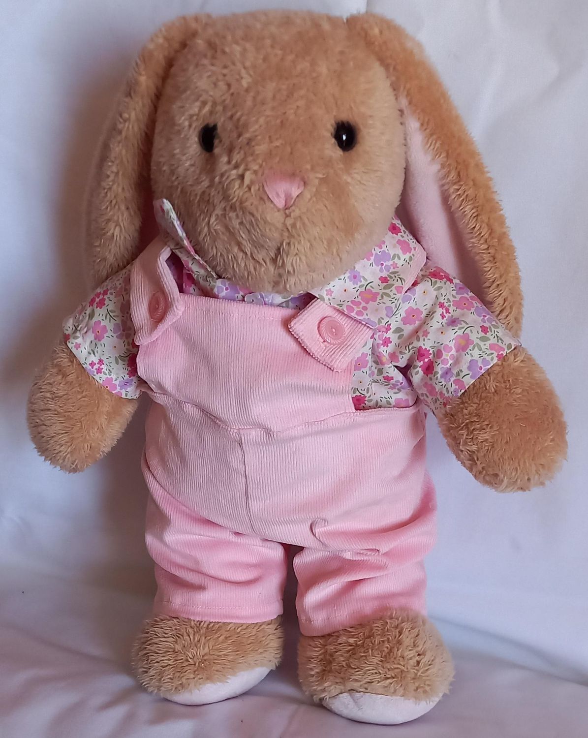 Dungarees with floral shirt outfit.