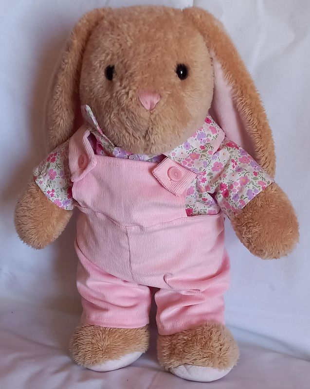 Dungarees with floral shirt outfit.