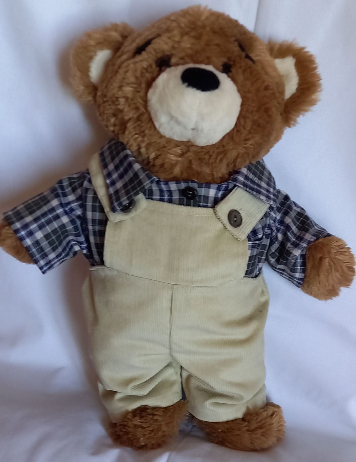 Dungarees: stone corduroy with check shirt.