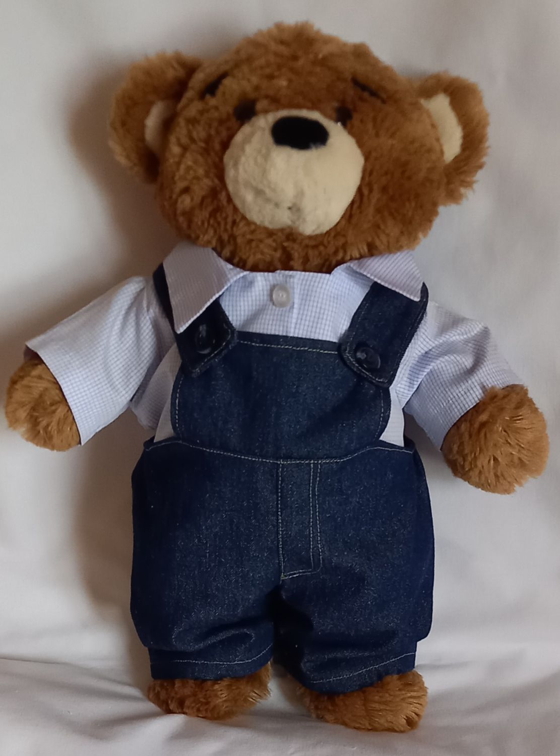 Dungarees: dark denim with tiny blue check shirt.