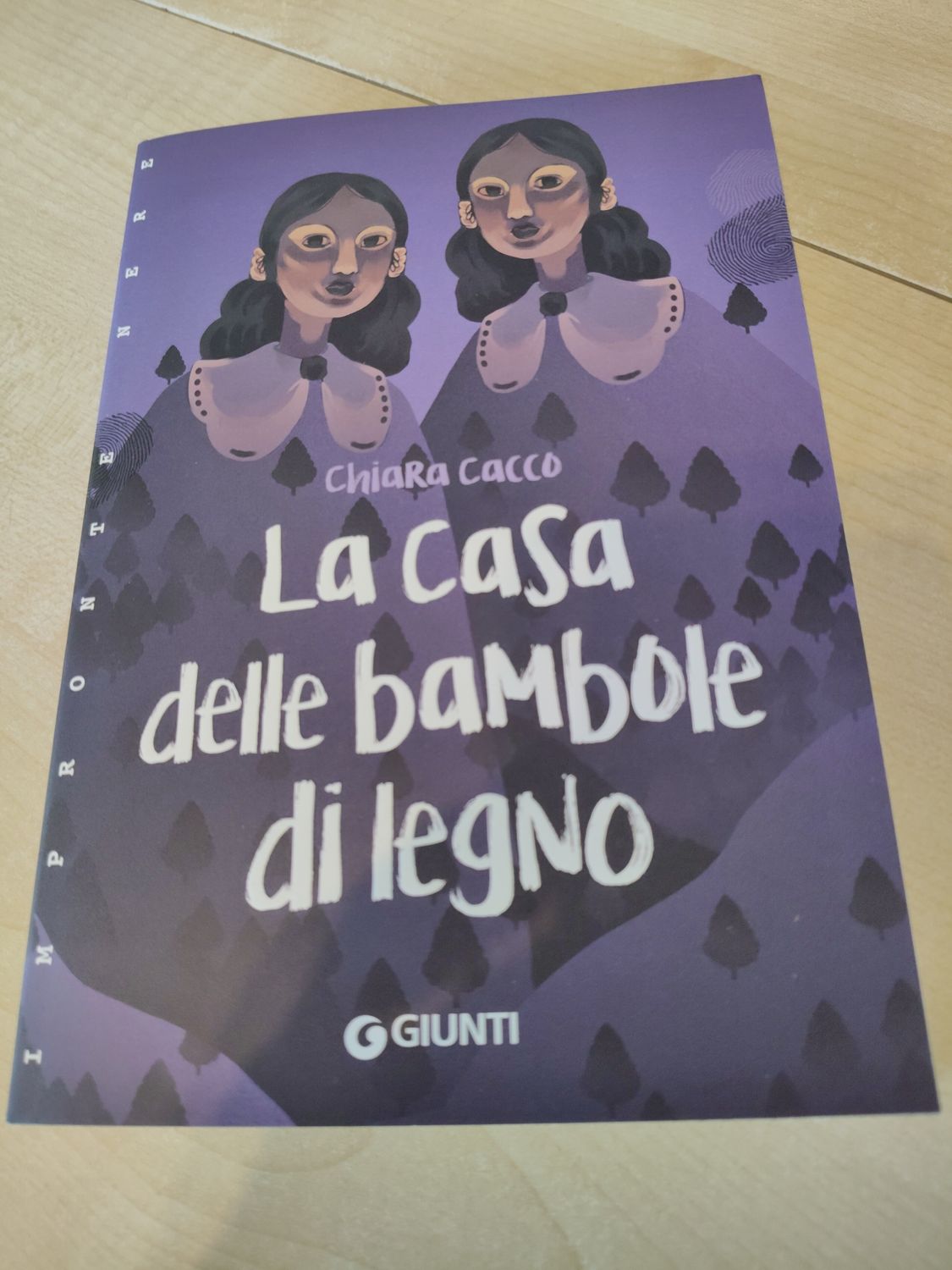 La casa delle bambole di legno