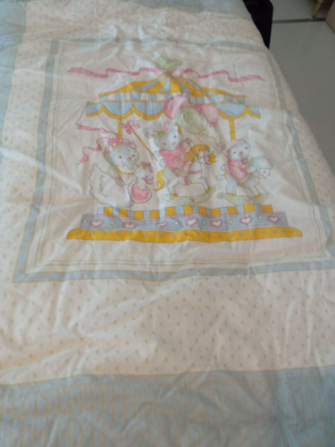 Coperta e lenzuola per lettino