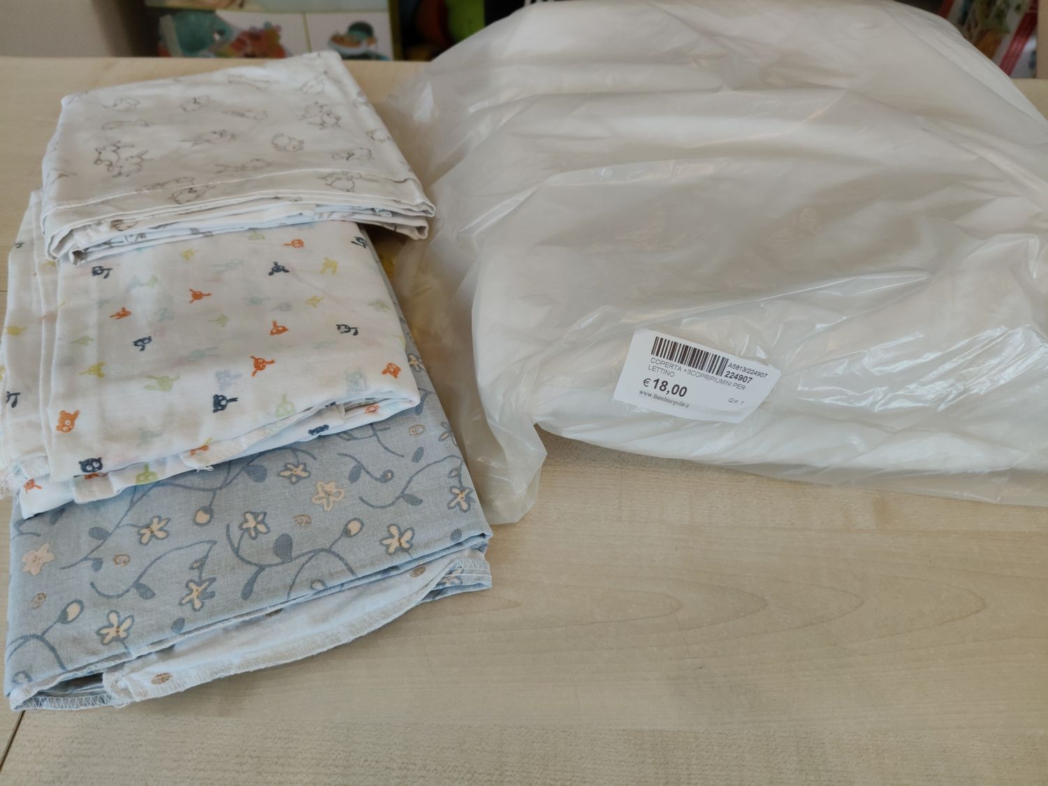 Coperta + 3 copripiumino per lettino