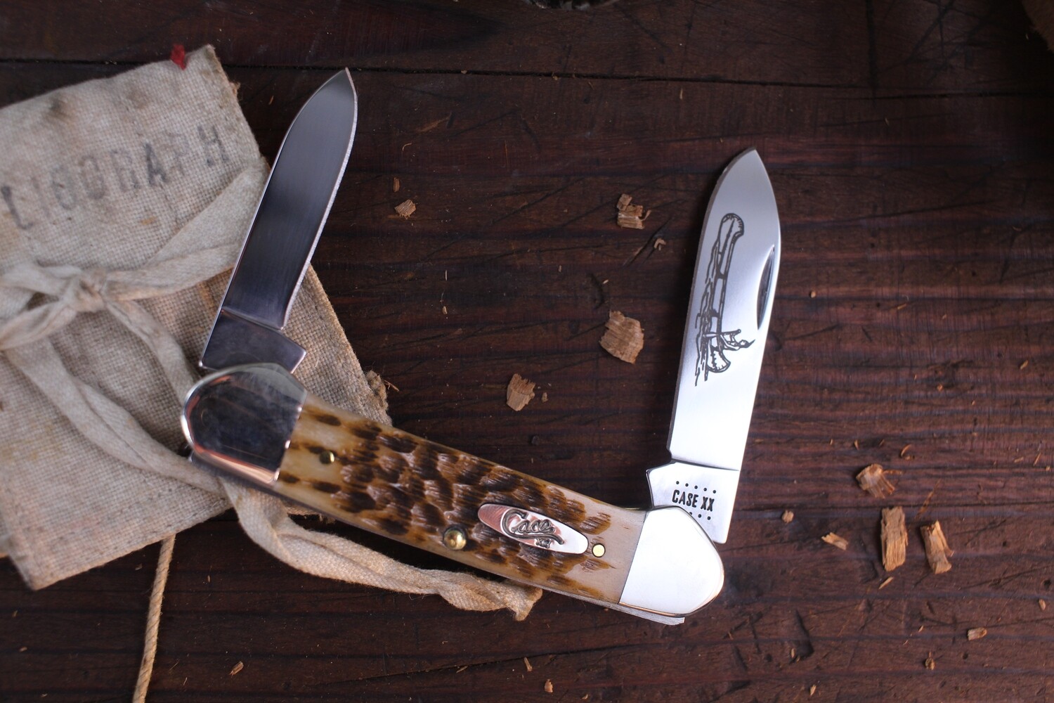 Case Canoe 62131CV 3.625&quot; / “Indian in canoe” / Amber Jigged Bone / Silver Bolsters