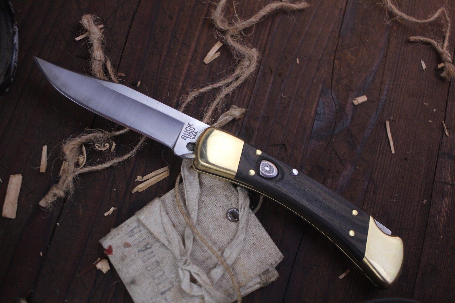Buck 110 Auto 3.75&quot; Auto Lockback Folder /  Brass Bolster &amp; Wood Scales / Satin 420 ( Pre Owned )