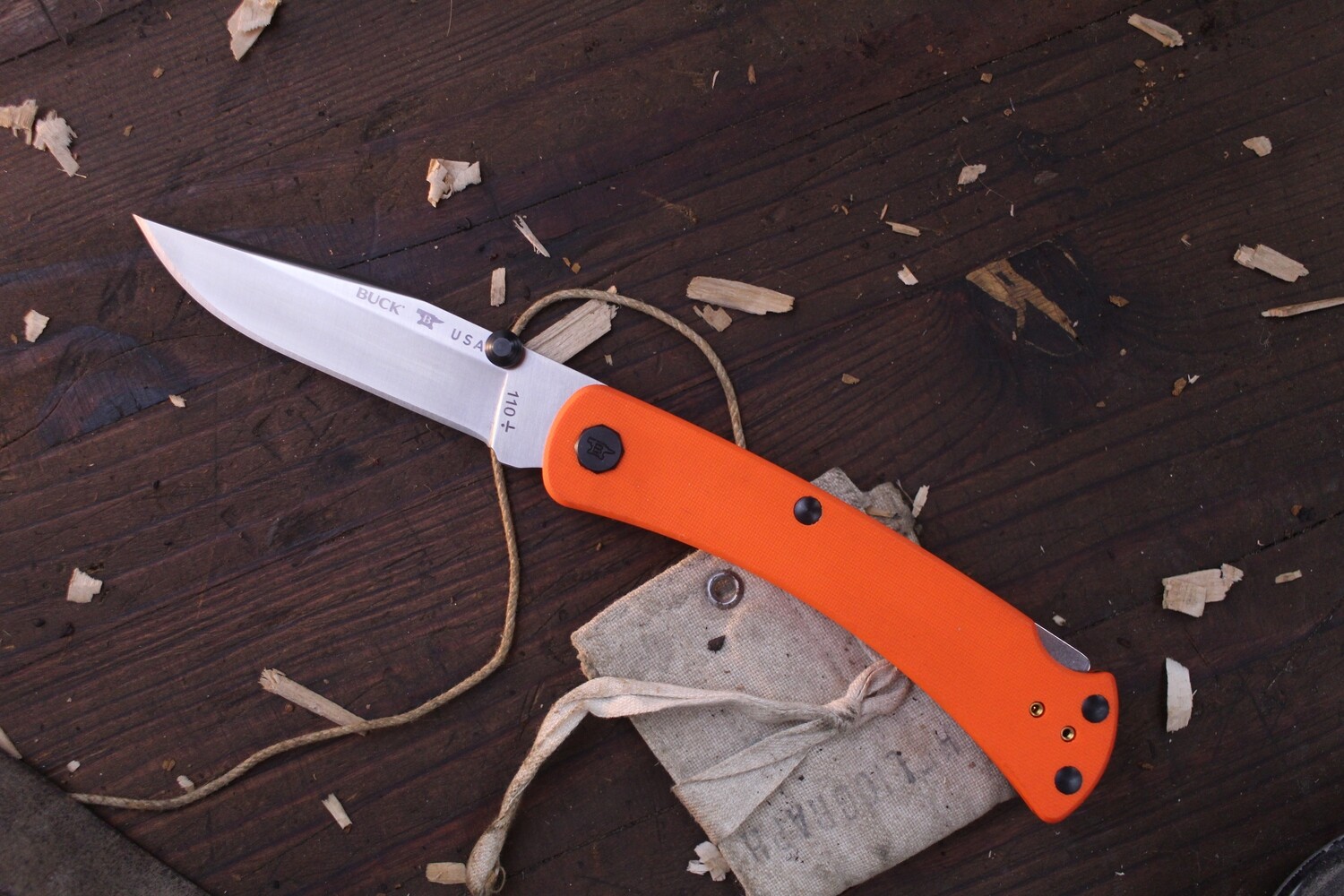 Buck 110 Slim Pro TRX 3.75&quot; Lockback Folder / Orange G-10 / Satin S30V