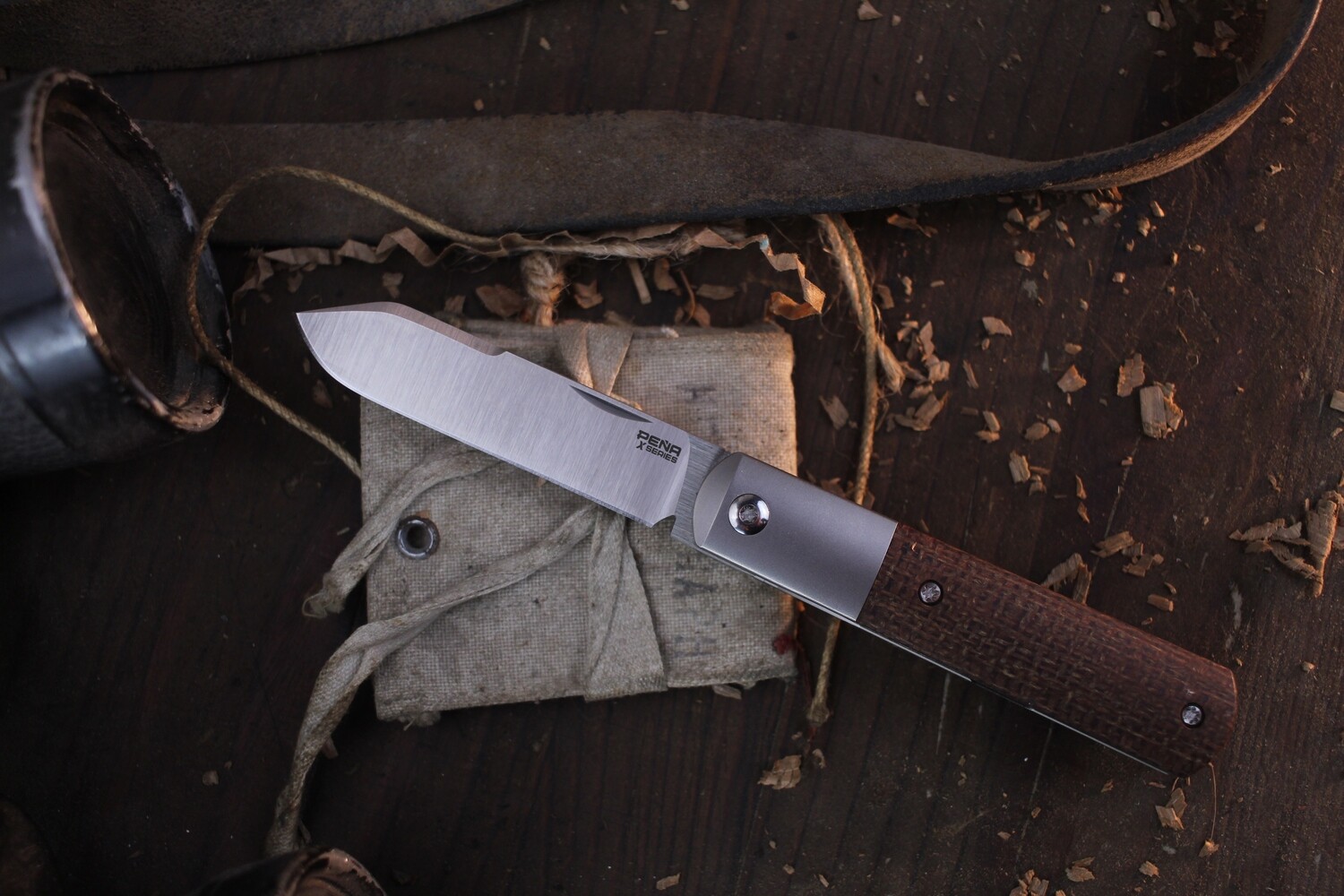 Pena X Series 2.875&quot; Barlow Front Flipper / Burlap Micarta &amp; Titanium / Satin M390 ( Pre Owned )
