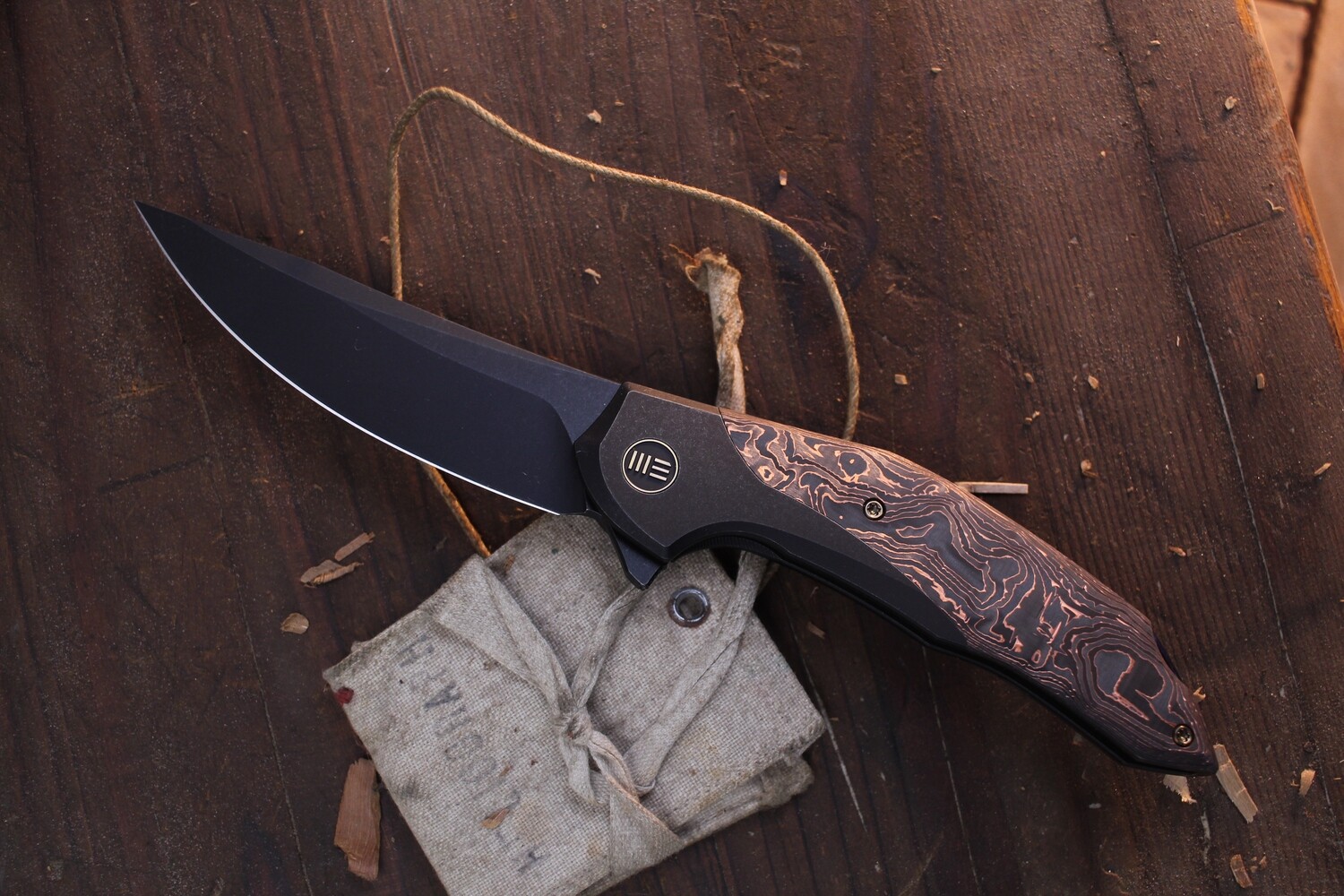 WE Knives Merata 3.7&quot; Folding Knife / Titanium &amp; Copperfoil Carbon Fiber With Timascus / Blackwashed 20CV ( Pre Owned )