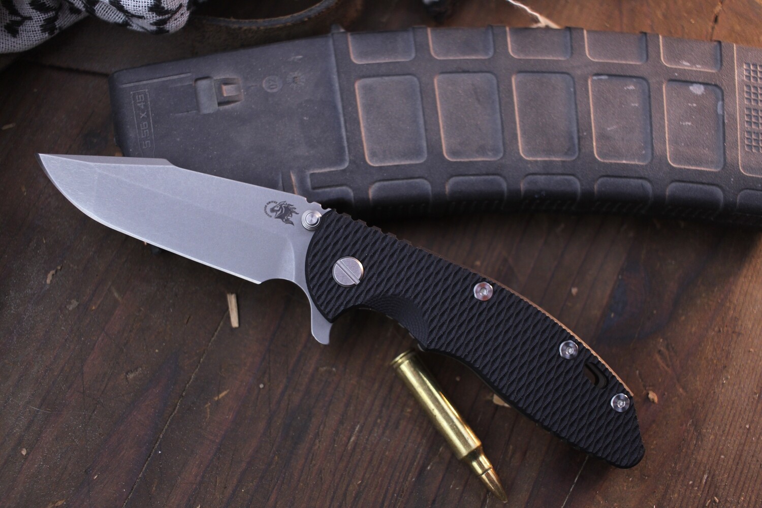 Hinderer XM-18 3.5&quot; Framelock Flipper / Black G-10 &amp; Battle Bronze Titanium / Working Finish S45VN Spanto