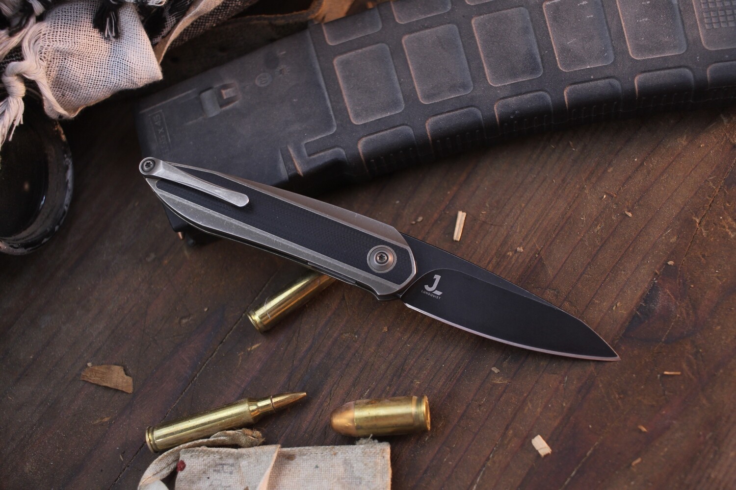WE Knife Black Void Opus 2.9&quot; Linerlock Front Flipper / Bronze Ti &amp; Black G-10 / Blackwashed Chisel Ground 20CV ( Pre Owned )