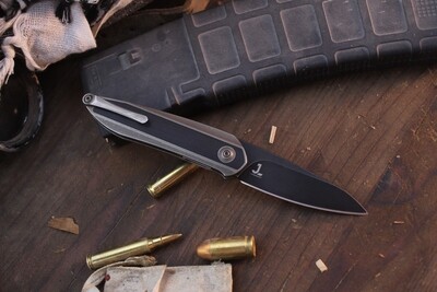 WE Knife Black Void Opus 2.9" Linerlock Front Flipper / Bronze Ti &amp; Black G-10 / Blackwashed Chisel Ground 20CV ( Pre Owned )