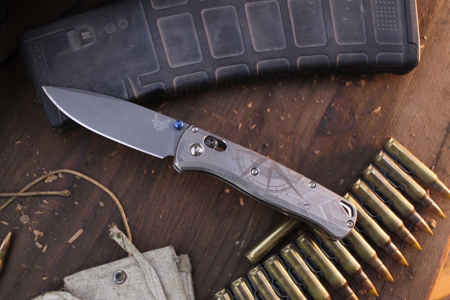 Benchmade Bugout 3.24&quot; AXIS Lock Folder / Custom Compass Rose Engraved Titanium / Gray S30V ( Pre Owned )