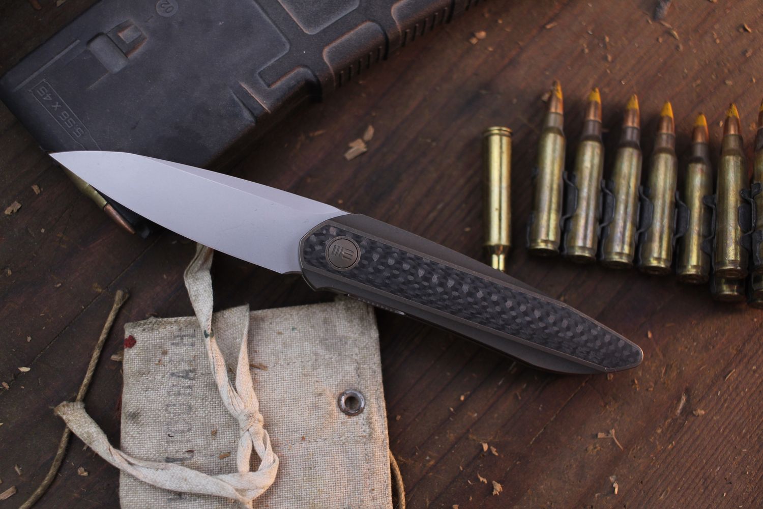 We Knife Co Black Void Opus 2.84&quot; Linerlock Front Flipper /Bronze Titanium &amp; Carbon Fiber / Stonewashed 20CV ( Pre Owned )