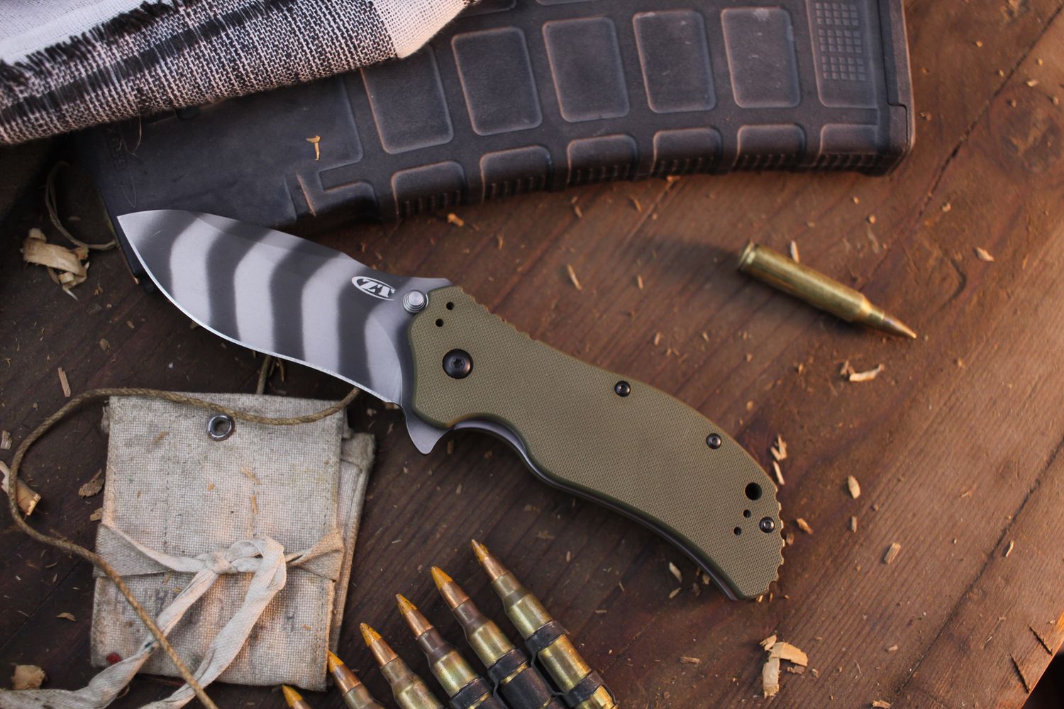 Zero Tolerance 0350 3.2&quot; Assisted Framelock Folder / OD Green G-10 / Tiger Striped MagnaCut ( Pre Owned )