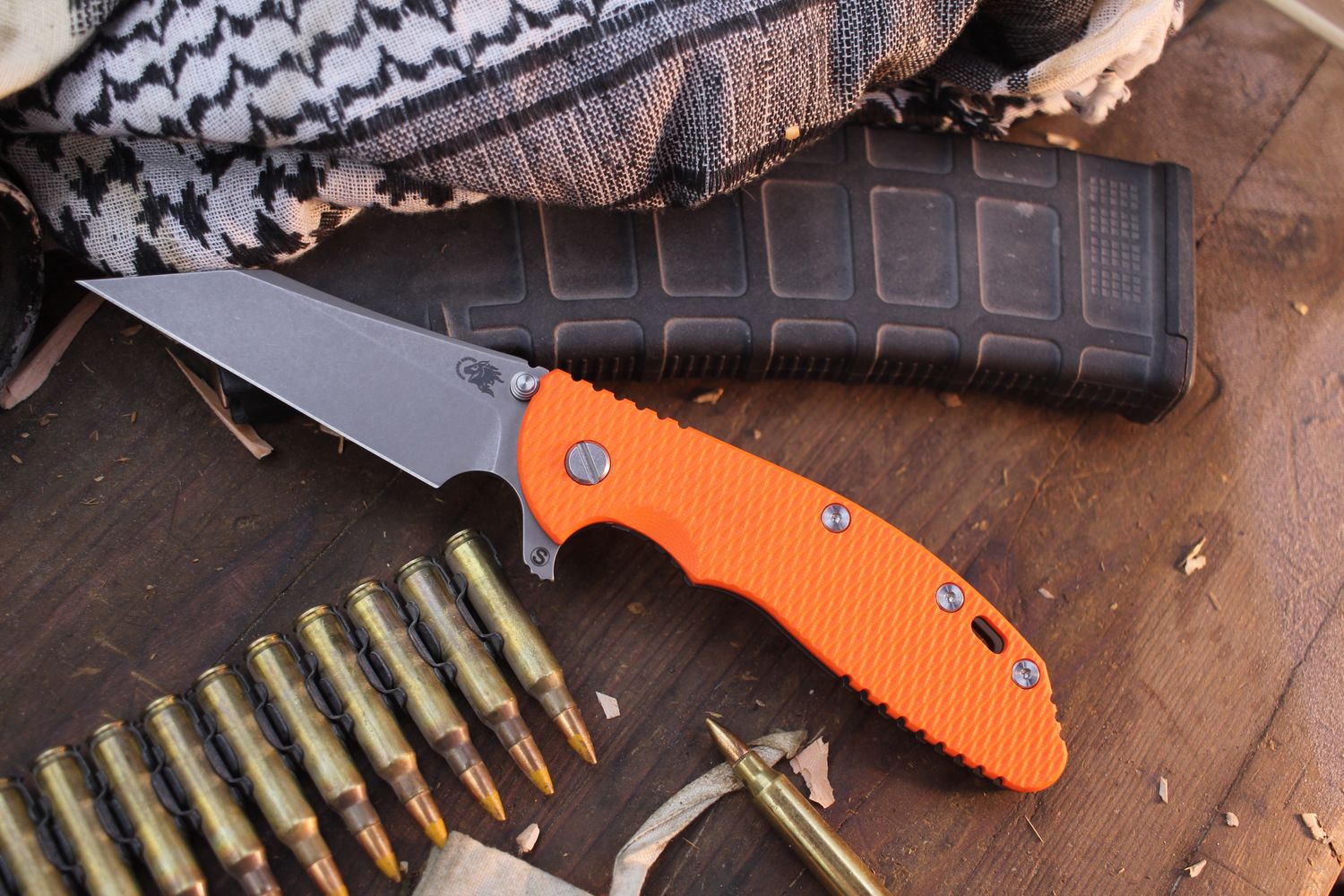 Hinderer Knives XM-24 Skinny Wharncliffe 4&quot; Framelock Flipper / Orange G-10 &amp; Battle Bronze Titanium / Stonewashed S45VN