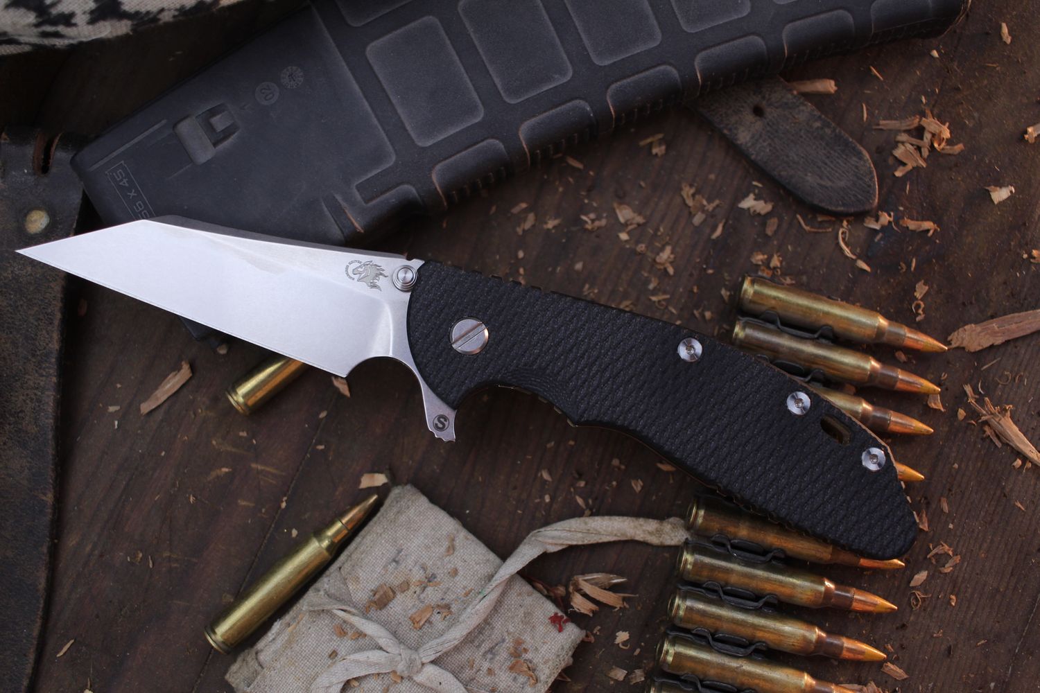 Hinderer Knives XM-24 Skinny Wharncliffe 4&quot; Framelock Flipper /  Black G-10 &amp; Stonewashed Bronze Titanium / Stonewashed S45VNpo