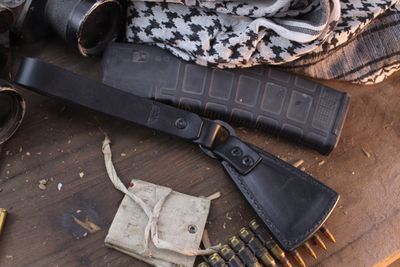 CLW &amp; RMJ Tactical Strapped Cow Bell Sap / Black Leather &amp; 8.3 Oz Lead Shot ( Pre Owned )