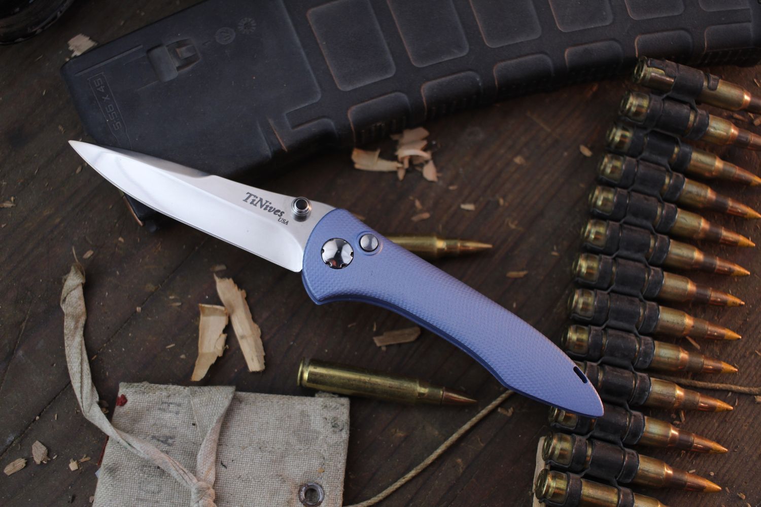 TiNives Hybrid Tactical 3.25” Button Lock Folder / Textured Blue Aluminum / Polished MagnaCut