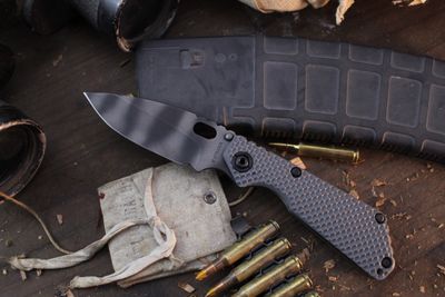 Strider SNG 3.75&quot; Framelock Folder / Grey G-10 Gunner Grip &amp; Flamed Ti / Tiger Strip CPM-154 ( Pre Owned )