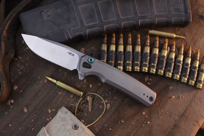 Zero Tolerance 0044 3.2&quot; Button Lock Flipper / Bead Blasted Titanium / Stonewashed S45VN ( Pre Owned )