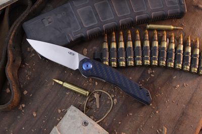 Zero Tolerance 0545 3.3&quot; Framelock Flipper / Black &amp; Blue Carbon Fiber  / Satin MagnaCut ( Pre Owned )