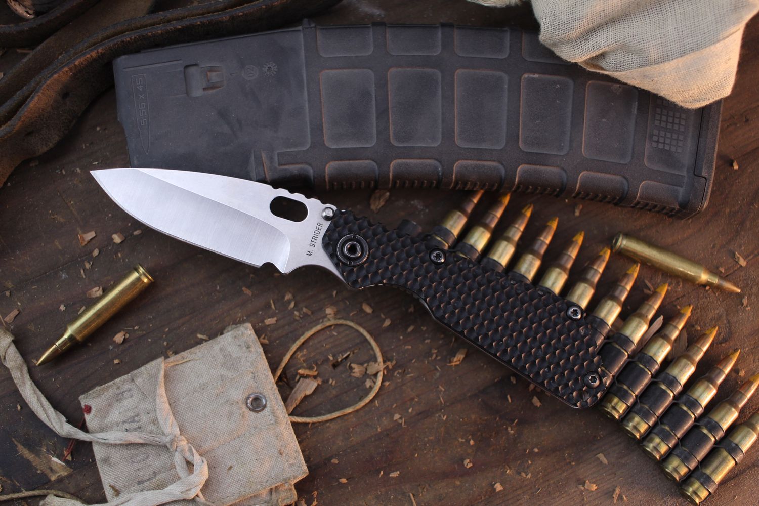 Strider SNG 3.5" Framelock Folder / Double Gunner Grip Black G-10 &amp; Titanium / Satin MagnaCut ( Pre Owned )