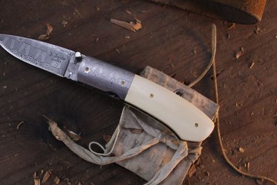 Don Dezarn 2.375" Custom LinerLock Folder / Creamy Ivory & Damascus Bolster / D. Thomas Basket Weave Damascus