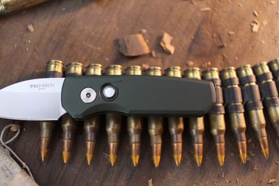 Pro-Tech Runt 5 Wharncliffe 1.9" Button Lock Auto Folder / Green Aluminum &amp; White Pearl Button / Satin MagnaCut