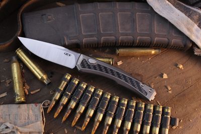 Zero Tolerance 0556 3.4" Button Lock Auto Folder / Titanium &amp; Carbon Fiber / Satin MagnaCut